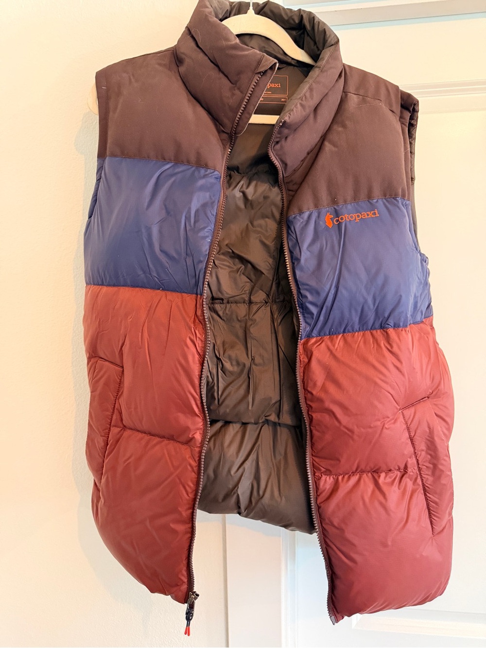 cotopaxi Black Jacket Interior with Cream Trim and Orange Logo